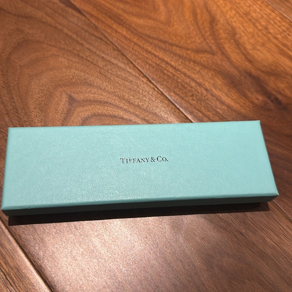 Authentic Tiffany box.